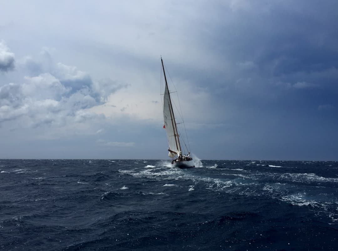 A sailing yacht under heavy weather